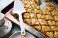 Coconut Baklava | www.diethood.com | Layers of phyllo sheets filled with shredded sweetened coconut and walnuts | #dessert #recipe #baklava #coconut