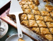 Coconut Baklava | www.diethood.com | Layers of phyllo sheets filled with shredded sweetened coconut and walnuts | #dessert #recipe #baklava #coconut
