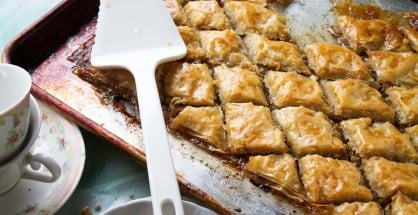 Coconut Baklava | www.diethood.com | Layers of phyllo sheets filled with shredded sweetened coconut and walnuts | #dessert #recipe #baklava #coconut