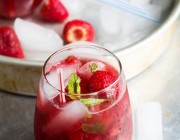 Strawberry Pom Mojito | www.diethood.com | Refreshing Mojito Cocktail made with strawberries and pomegranate juice | #recipe #cocktail #mojito #strawberries #oxo