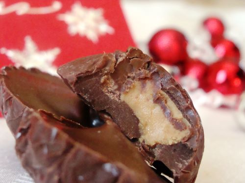 Homemade chocolate covered peanut butter cup with a bite out of it