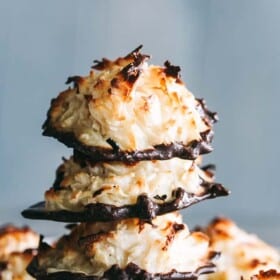 a photo of four stacked coconut macaroons.