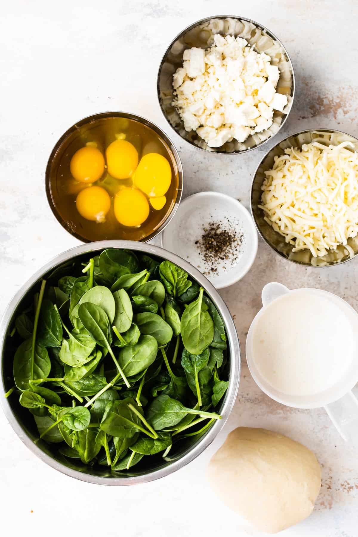 Ingredients for spinach quiche.