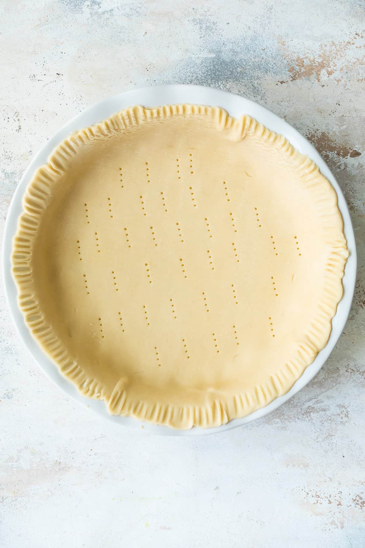 Pie crust with fork indentations.