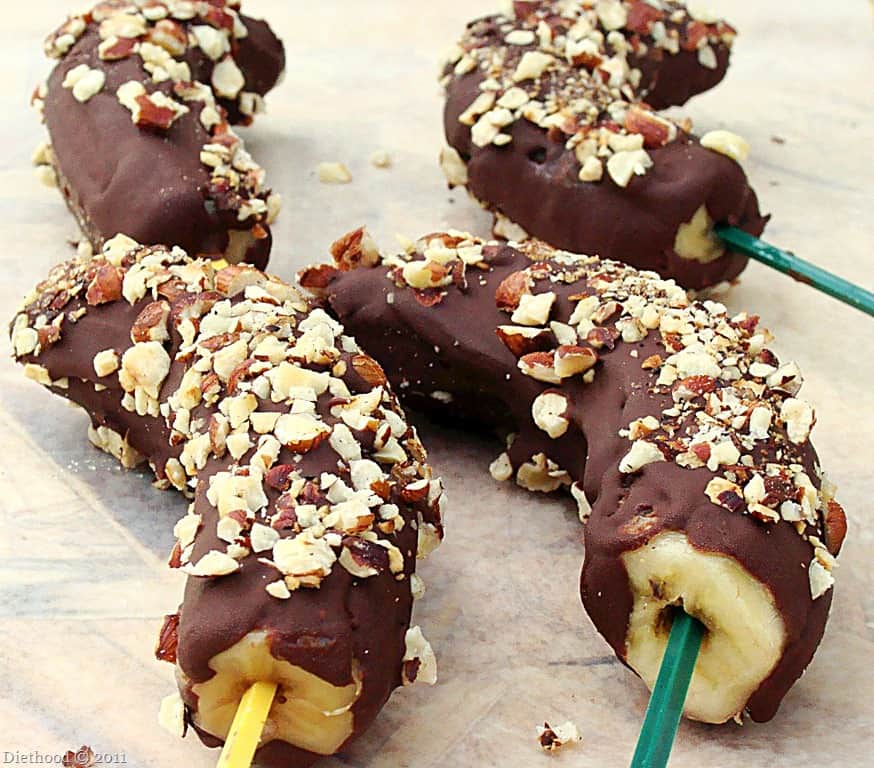 Chocolate Covered Frozen Bananas: Frozen bananas dipped in chocolate and hazelnuts.