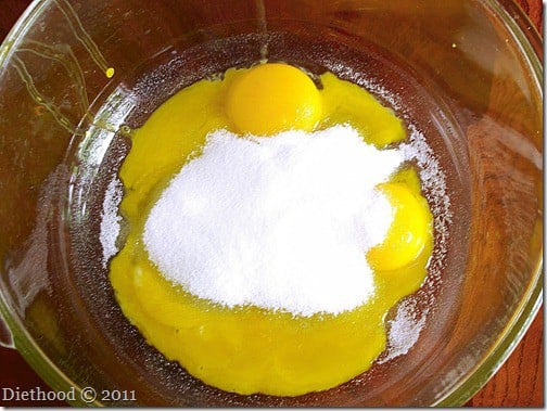 egg yolks with sugar in a mixing bowl
