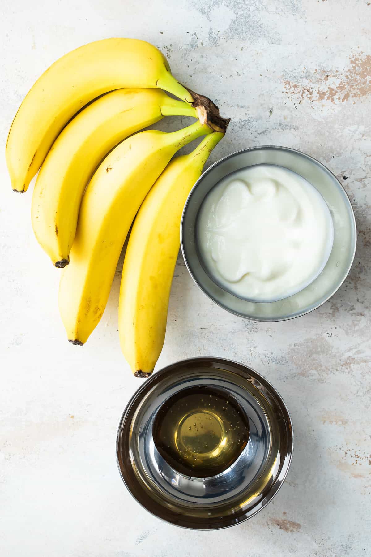 Ingredients for banana frozen yogurt.