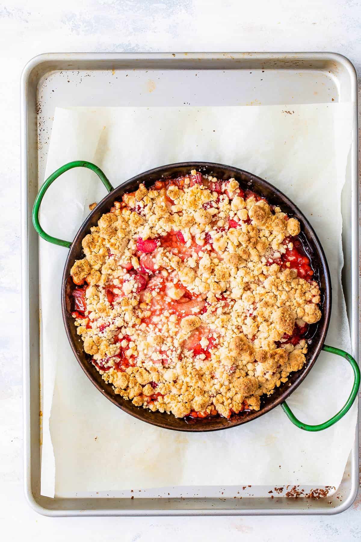 Pan full of strawberry rhubarb crumble.