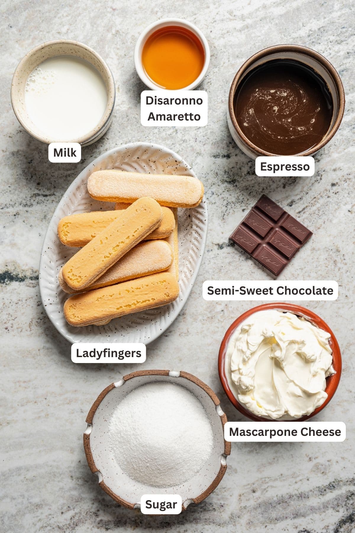 Ingredients for homemade tiramisu ice cream with text labels overlaying each ingredient.