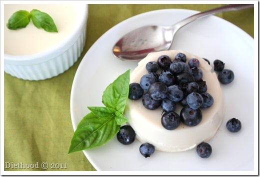 Sweet Basil Panna Cotta topped with blueberries on a plate