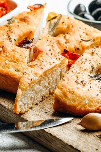 Italian Focaccia with tomatoes, olives, and rosemary.