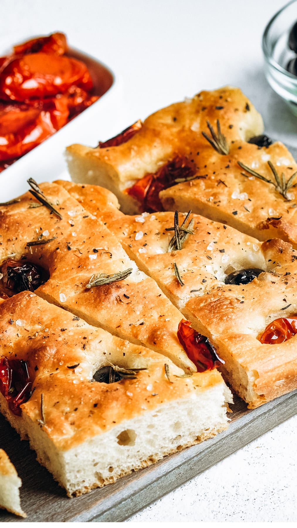 Traditional Italian Focaccia with tomatoes, olives