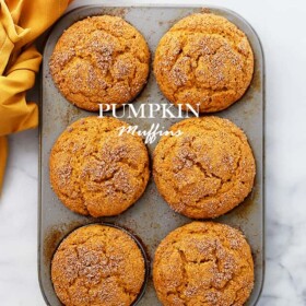 Fresh baked pumpkin muffins in a muffin tray