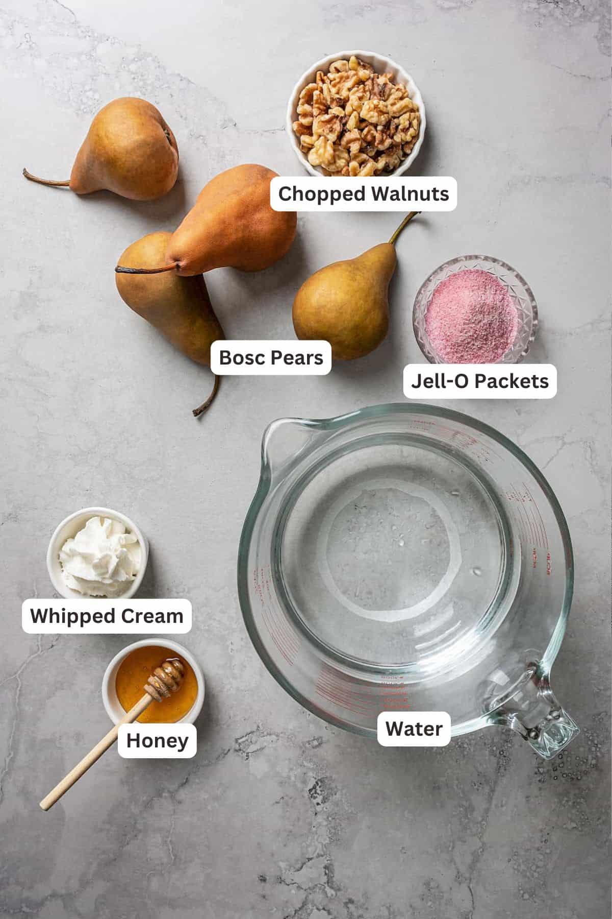 These rosy poached pears use Jell-O instead of wine or syrup, and only take 40 minutes to make. It's an easy, fancy dessert without trying! Ingredients for Blushing Poached Pears.