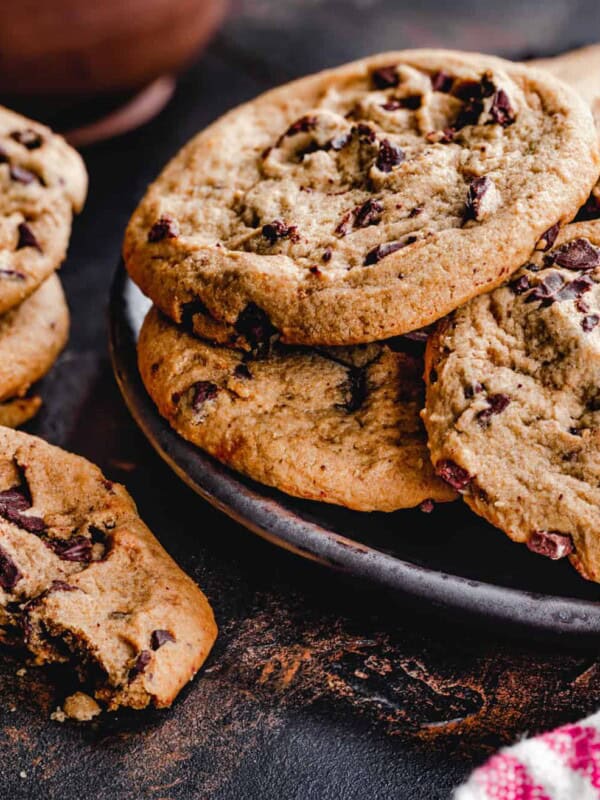 Close up of a plate with peanut butter cups cookies on a dark wooden table