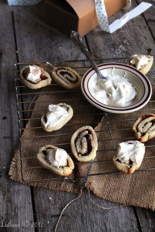 cinnamon roll sugar cookies with cream cheese frosting via www.diethood.com | #recipe #cinnamonroll #cookies