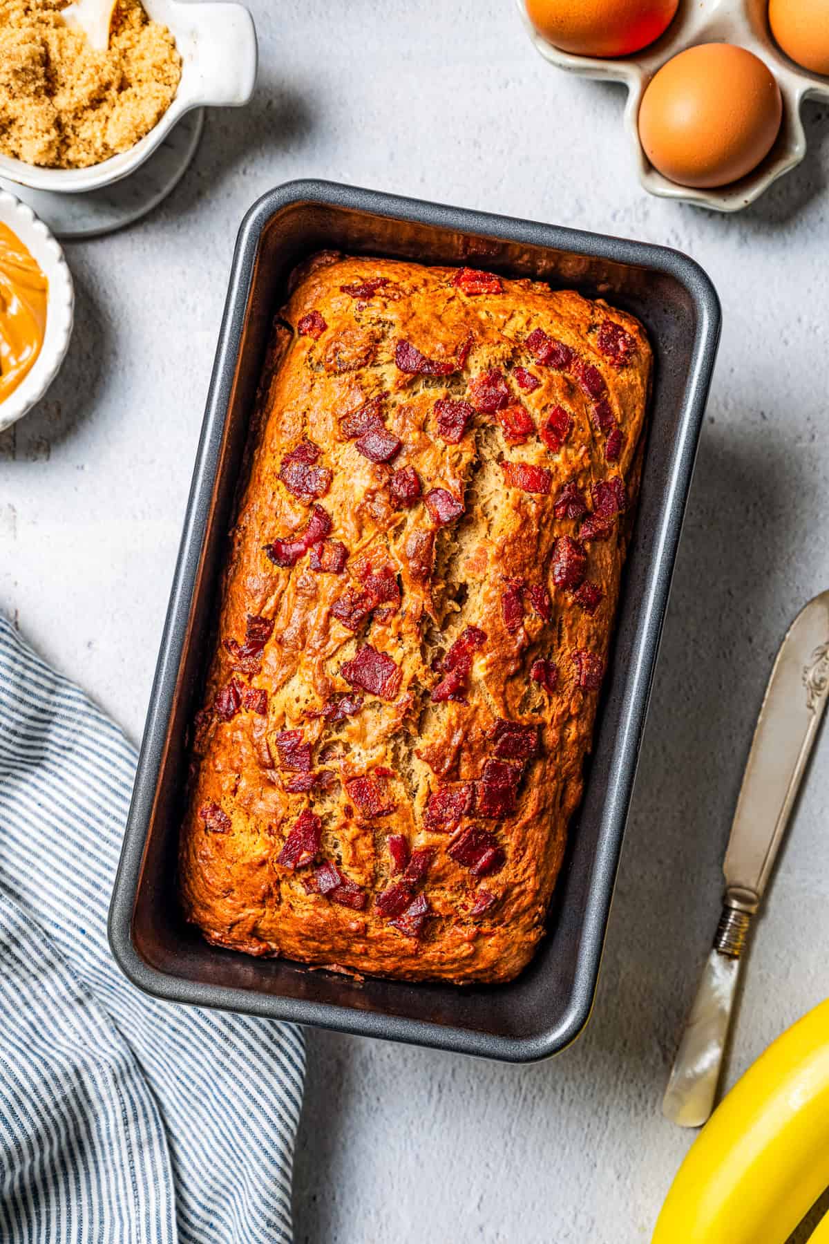 Baked peanut butter banana bread in a loaf pan.