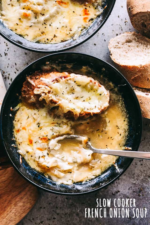 Slow Cooker French Onion Soup - This classic, hearty, DELICIOUS French Onion Soup is prepared in the crock pot, and it's loaded with incredible flavor, caramelized onions, and CHEESE!