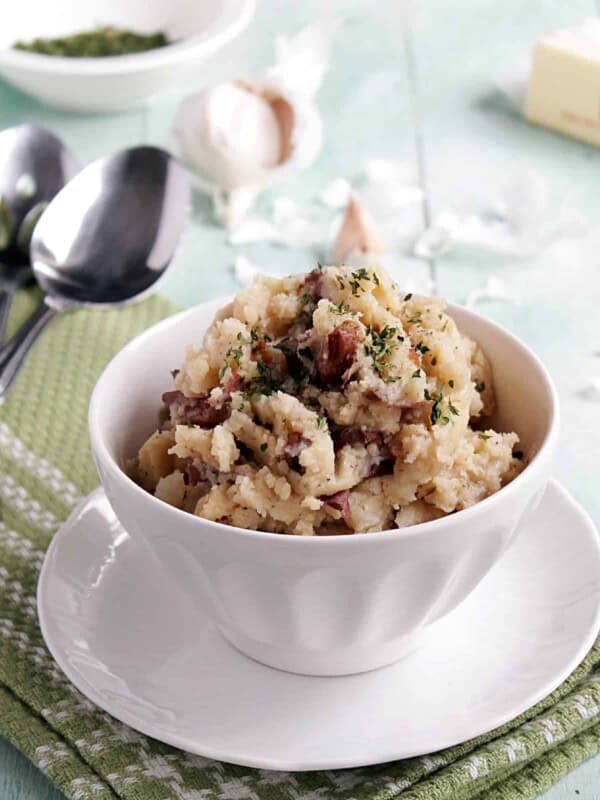 Slow cooker country style garlic mashed potatoes in a bowl.