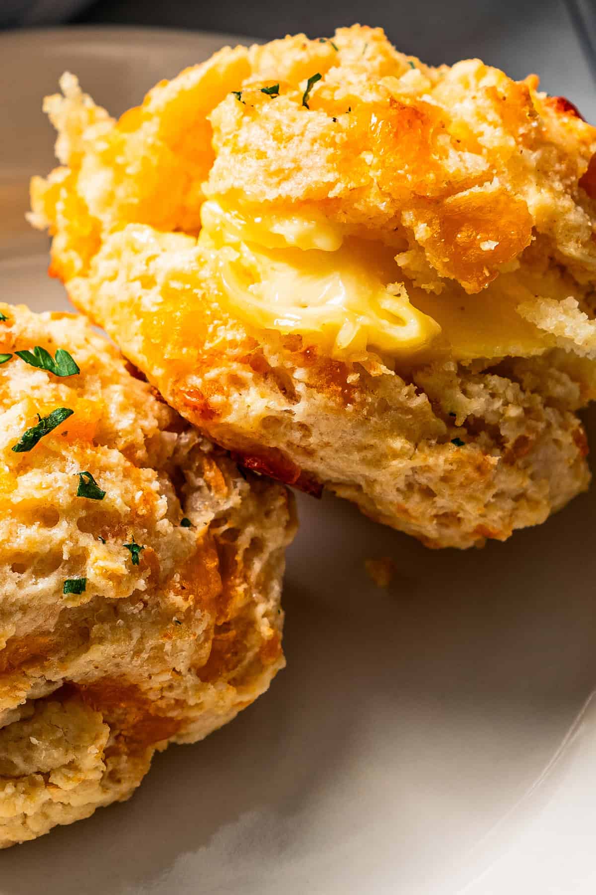 Closeup image of homemade biscuits on a plate.