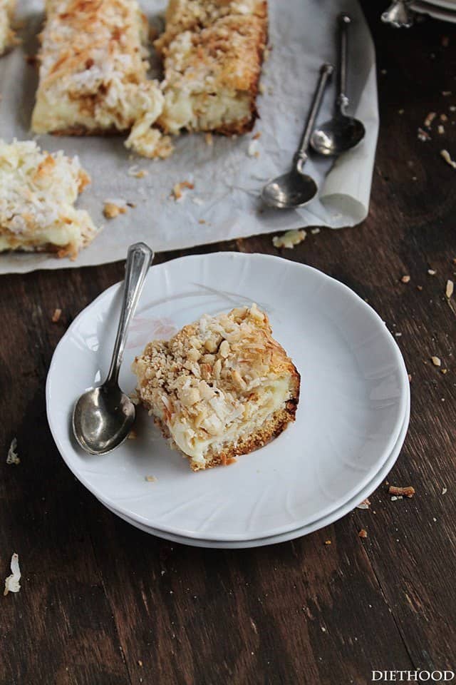Coconut Milk Bars | www.diethood.com | Moist, extra sweet Coconut Milk Bars made with milk, shredded coconut, and a sprinkle of hazelnuts | #recipe #cookies #desserts #coconut