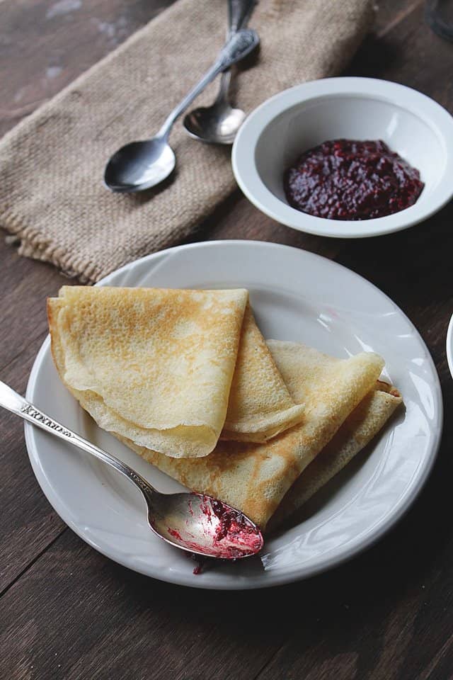 Lemon Crepes with Raspberry Sauce | www.diethood.com | Warm, sweet raspberry sauce over fluffy, citrusy crepes is delightful | #recipe #crepes #breakfast #sauce #mardigras