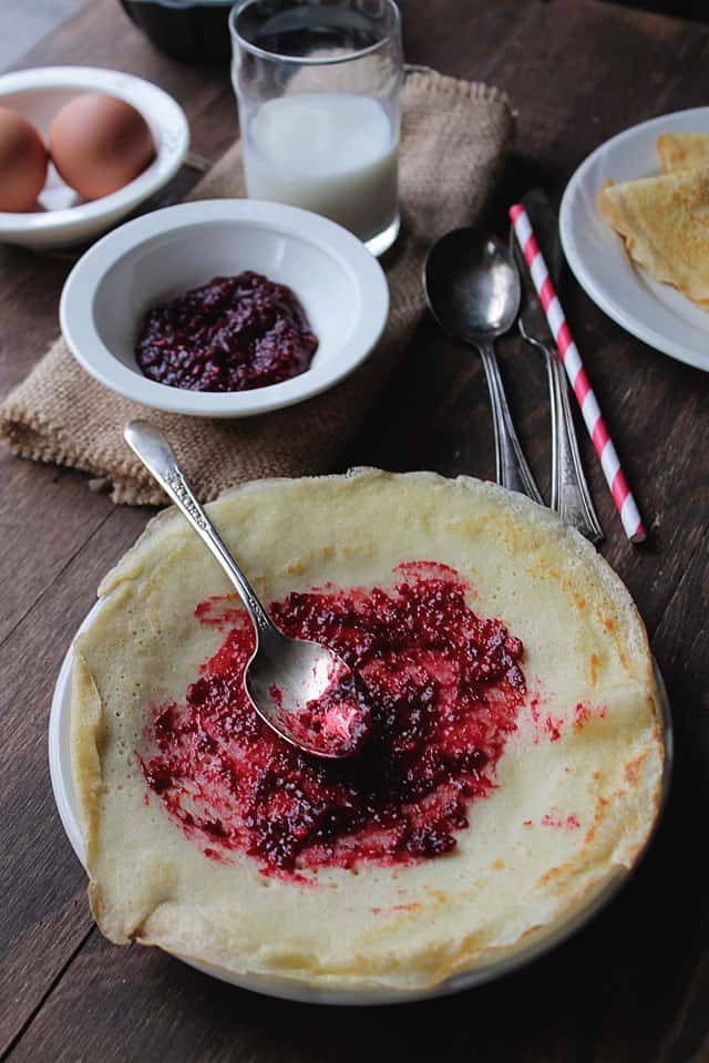 Lemon Crepes with Raspberry Sauce | www.diethood.com | Warm, sweet raspberry sauce over fluffy, citrusy crepes is delightful | #recipe #crepes #breakfast #sauce #mardigras