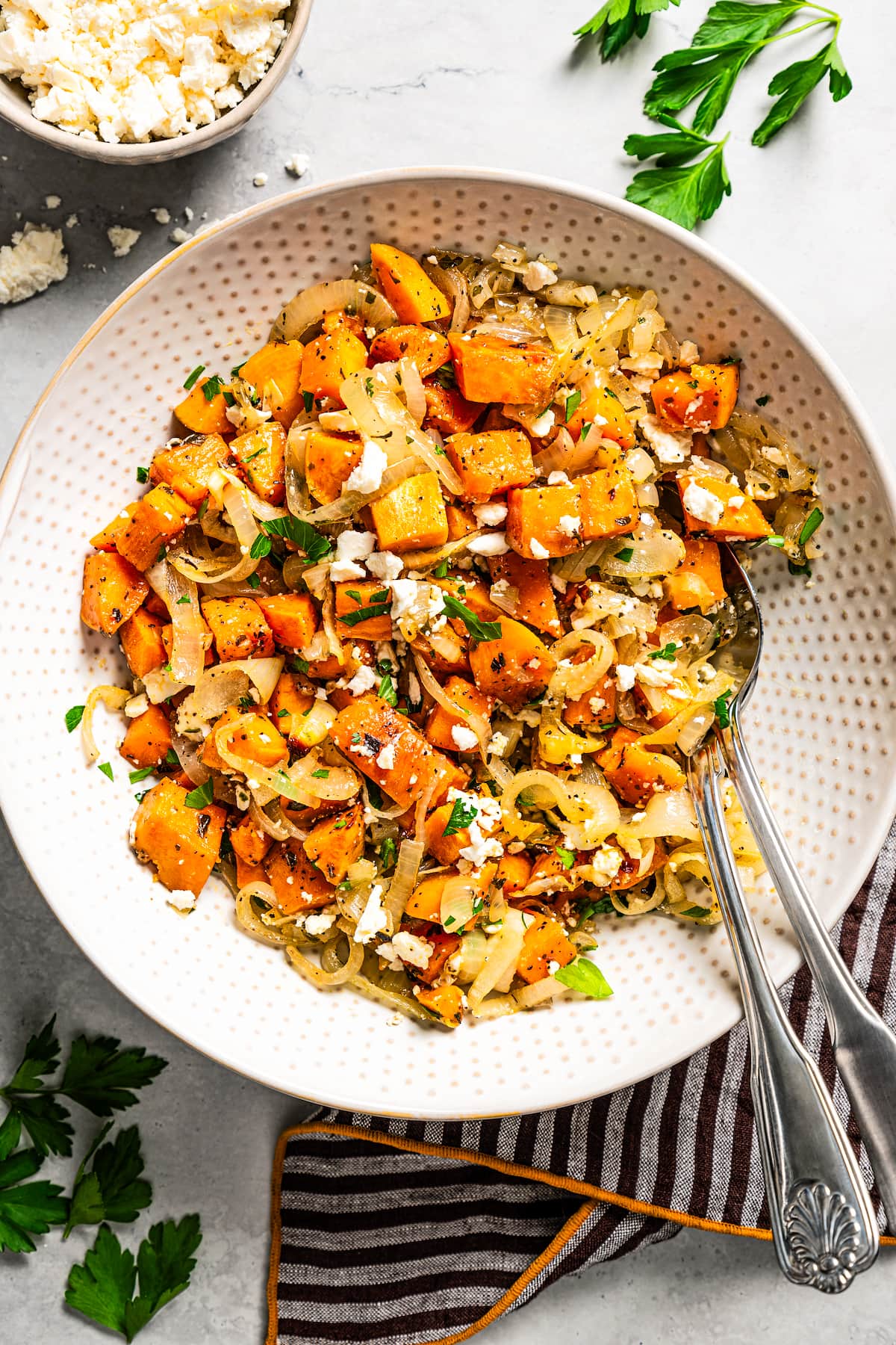 Overhead image of sweet potato hash served in a bowl.