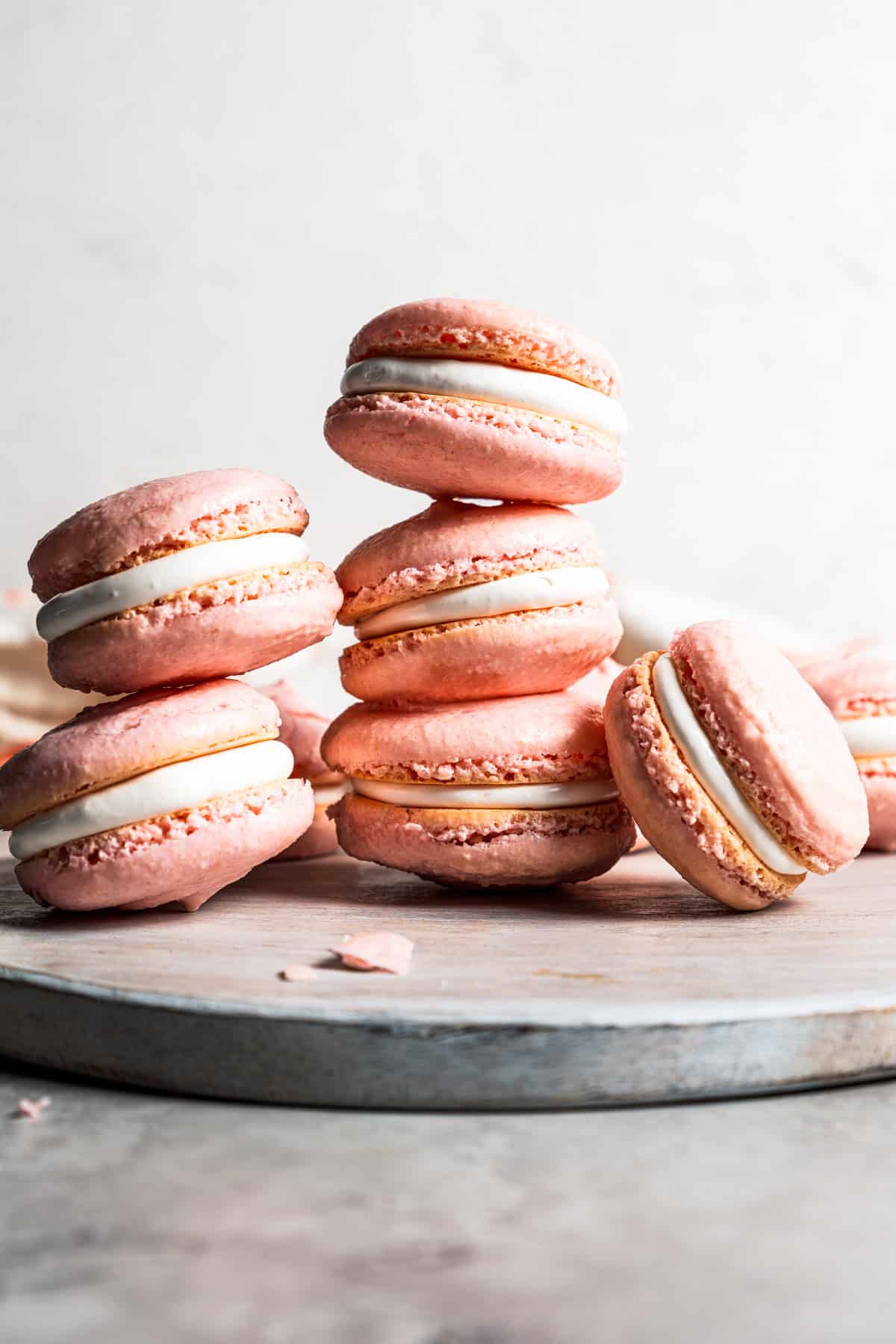 A stack of French macarons with marshmallow filling.