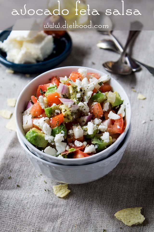 Fresh and chunky avocado salsa with diced tomato and feta cheese crumbles.