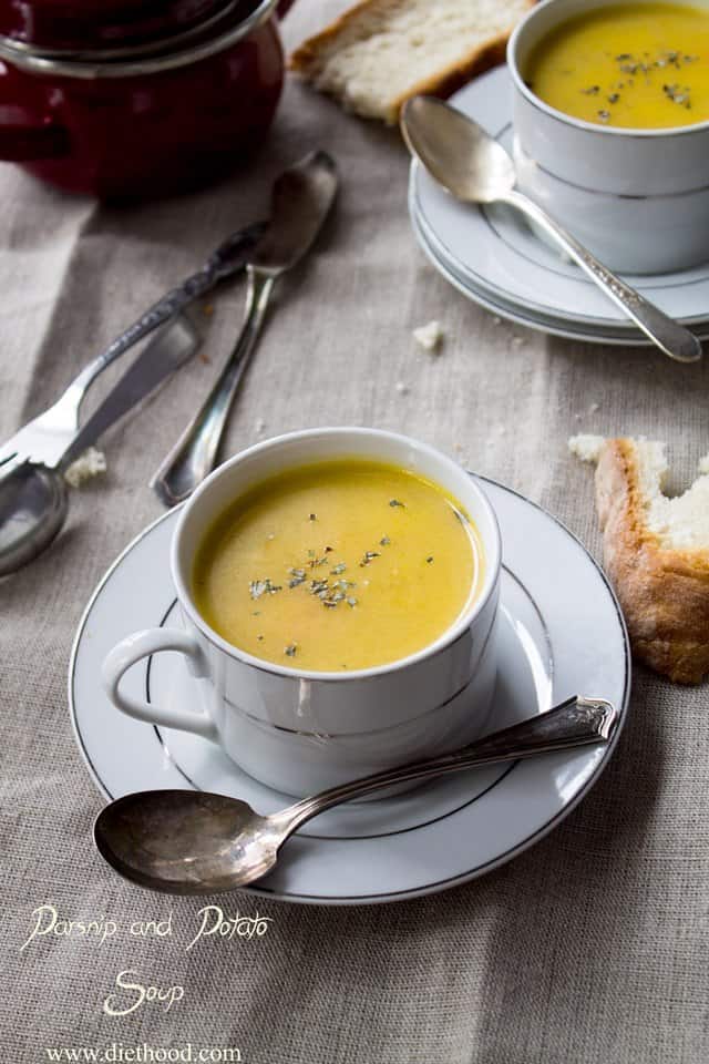 Homemade fall soup made with parsnips, carrots, potatoes, and onions in a bowl. 