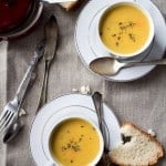 Overhead photo of two bowls of homemade parsnip potato soup.