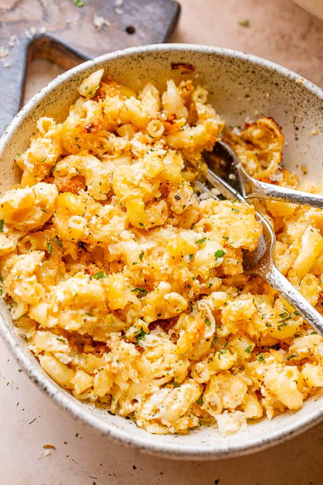 close up of macaroni and feta in a bowl