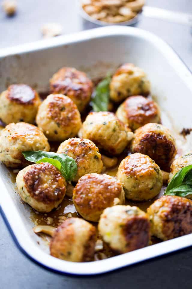 Chicken meatballs are cooked in the oven.