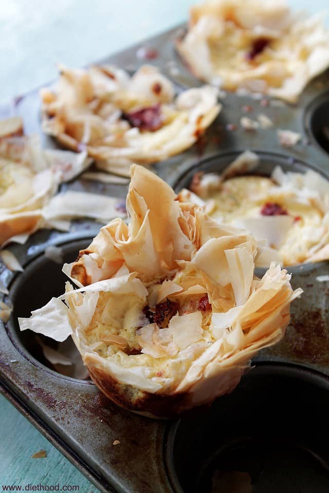 Close-up of Sun-Dried Tomatoes & Cheese Cups in a muffin tin
