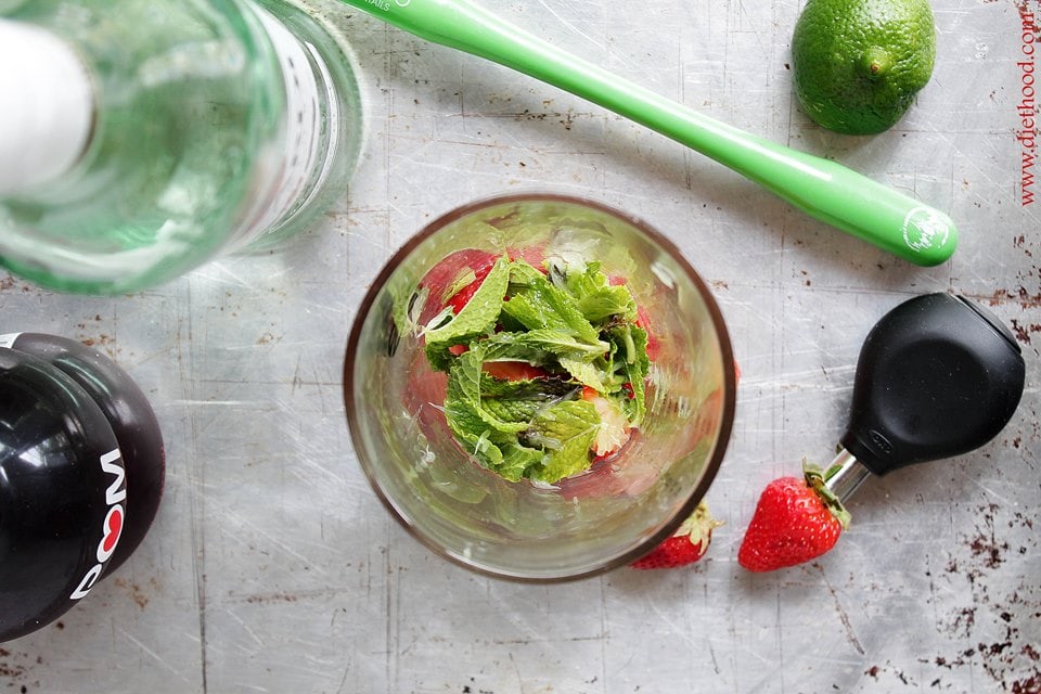 Refreshing strawberry pom mojito