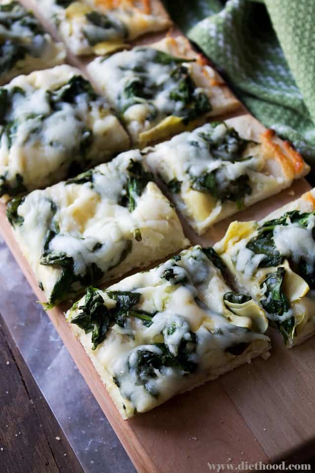 Spinach and Artichoke Dip Pizza | www.diethood.com | Homemade pizza crust topped with spinach, cream cheese, and artichokes | #recipe #pizza #dinner