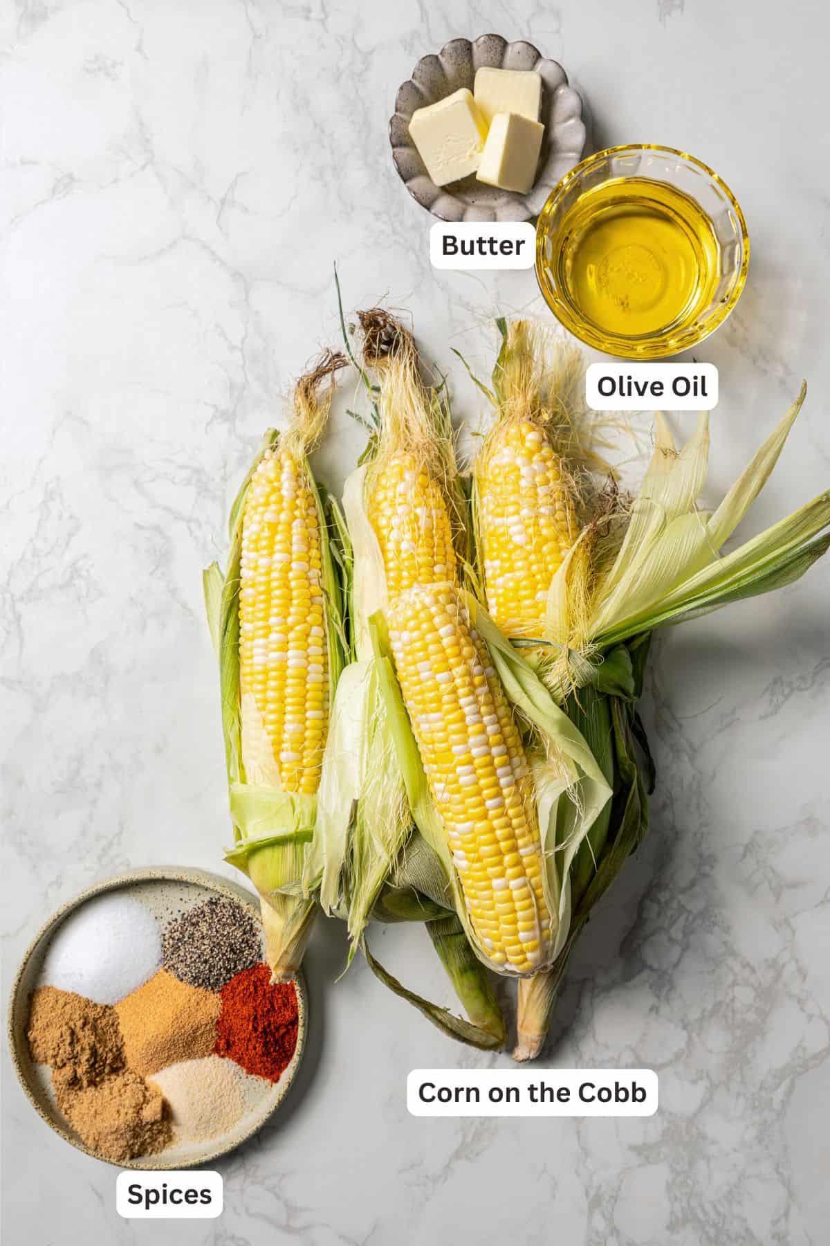 Ingredients for corn ribs with text labels over each ingredient.