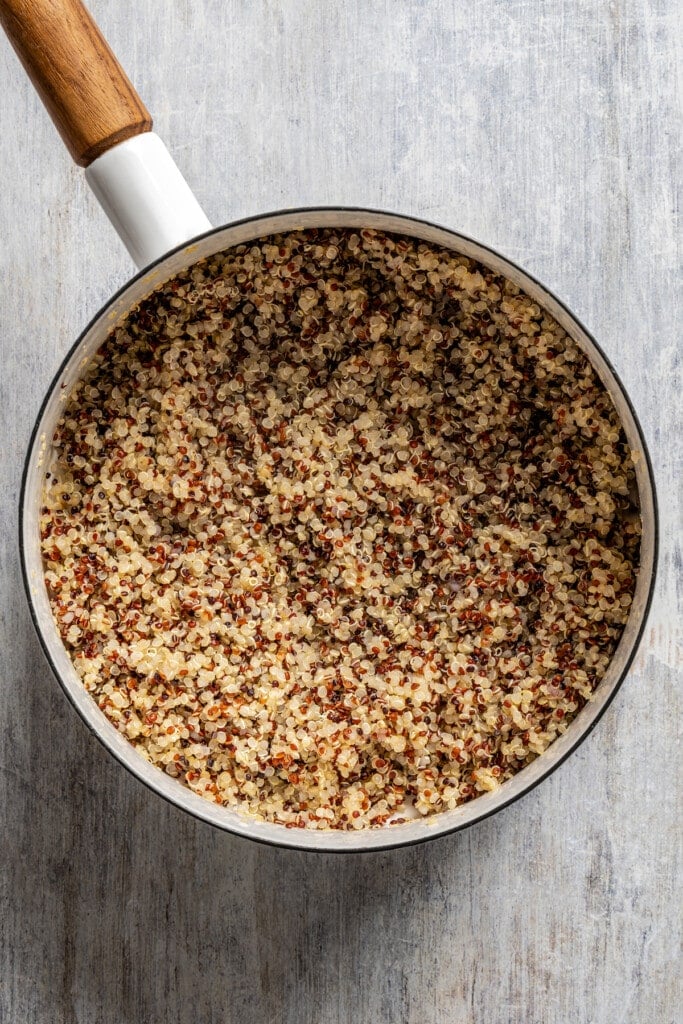 A pot of cooked quinoa.