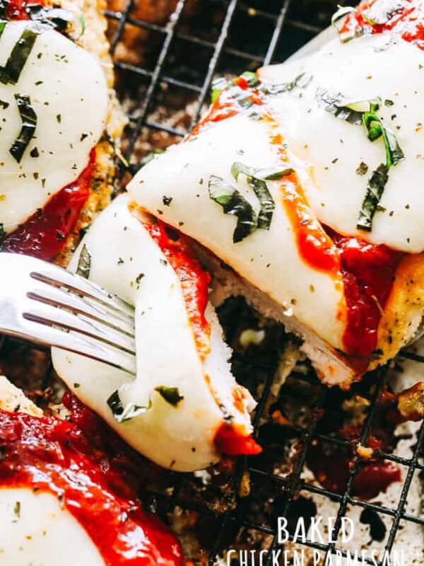 Baked chicken parmesan with mozzarella and marinara sauce.