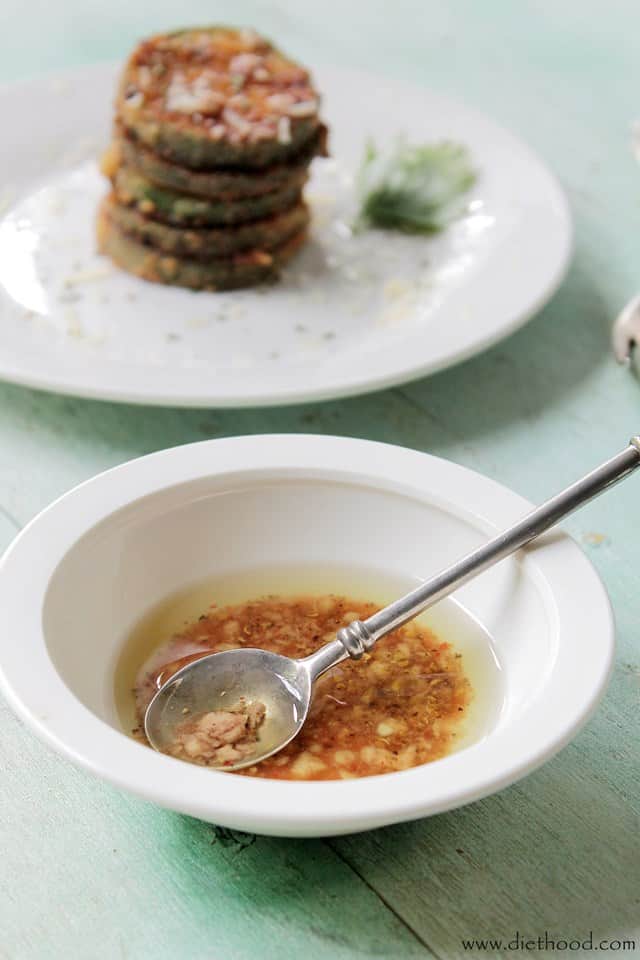 Fried Zucchini with Garlic Vinaigrette | www.diethood.com | Zucchini rounds coated in breadcrumbs, fried to a crisp, and dressed with a drizzle of a garlic vinaigrette. | #zucchini #recipes