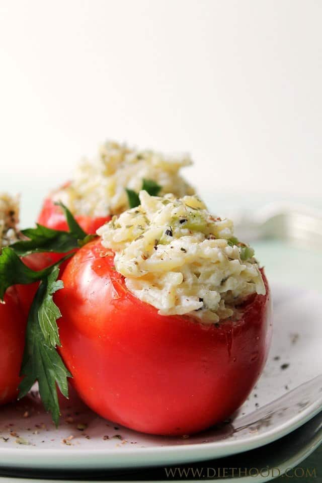 Image of a tomato stuffed with orzo.
