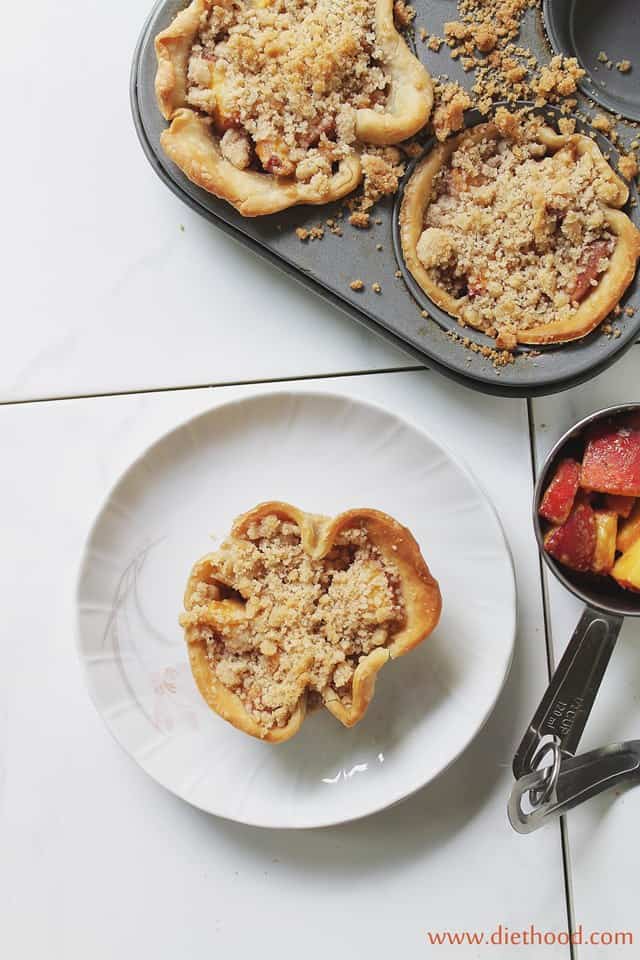 Ginger Peach Pie | www.diethood.com | Individual pies filled with an extraordinary pie filling of diced fresh peaches, ginger, brown sugar, and finished off with a crumb topping. | #pie #recipe #peaches