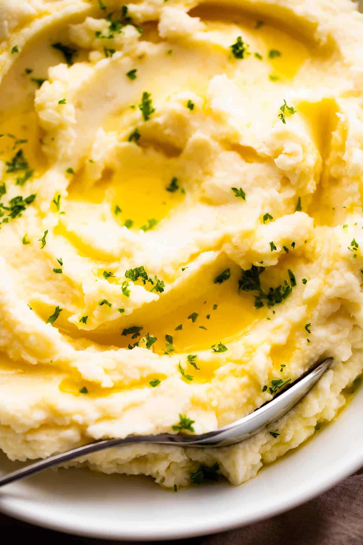 Garlic Rosemary Mashed Potatoes in a white bowl.
