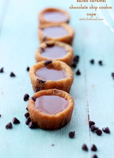 A row of salted caramel cookie cups with chocolate chips.