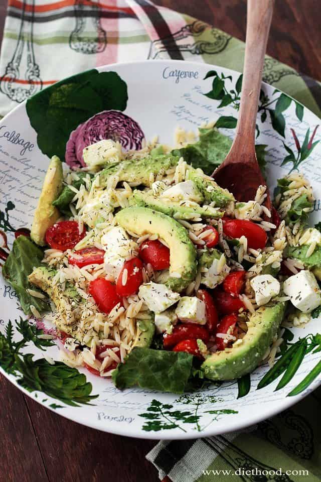 Avocado and Feta Cheese Orzo Salad served in a salad bowl.