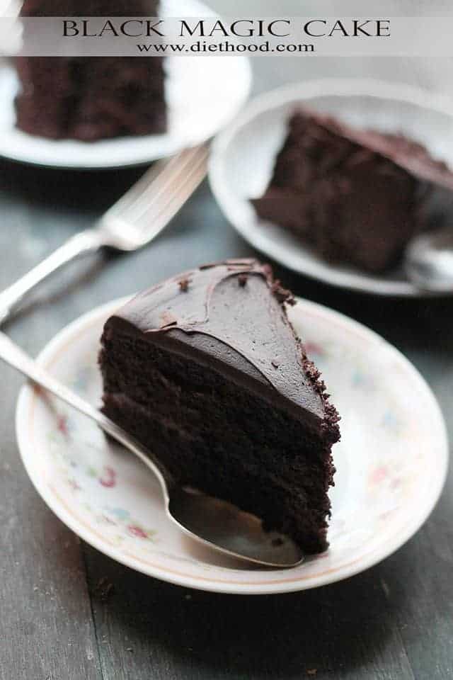 Chocolate cake slices are served on dessert plates.