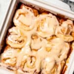 Overhead view of caramel rolls in a baking dish.