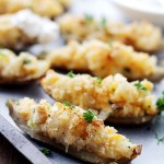Garlicky Cheesy Crispy Potato Skins | www.diethood.com | Garlicky and Cheesy Crispy Potato Skins topped with three cheeses, sour cream, crushed croutons and green onions. | #recipe #appetizers #potatoskins