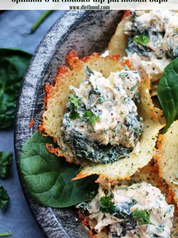 Spinach Artichoke Dip Served In Cheese Cups on a platter